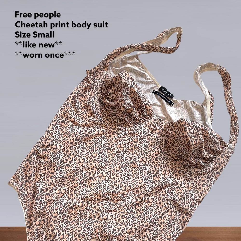 Free people Cheetah print body suit. Size small.